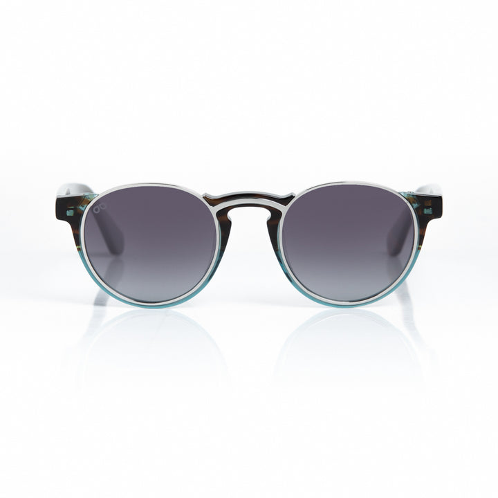 Round sunglasses with a black and green frame on a white background
