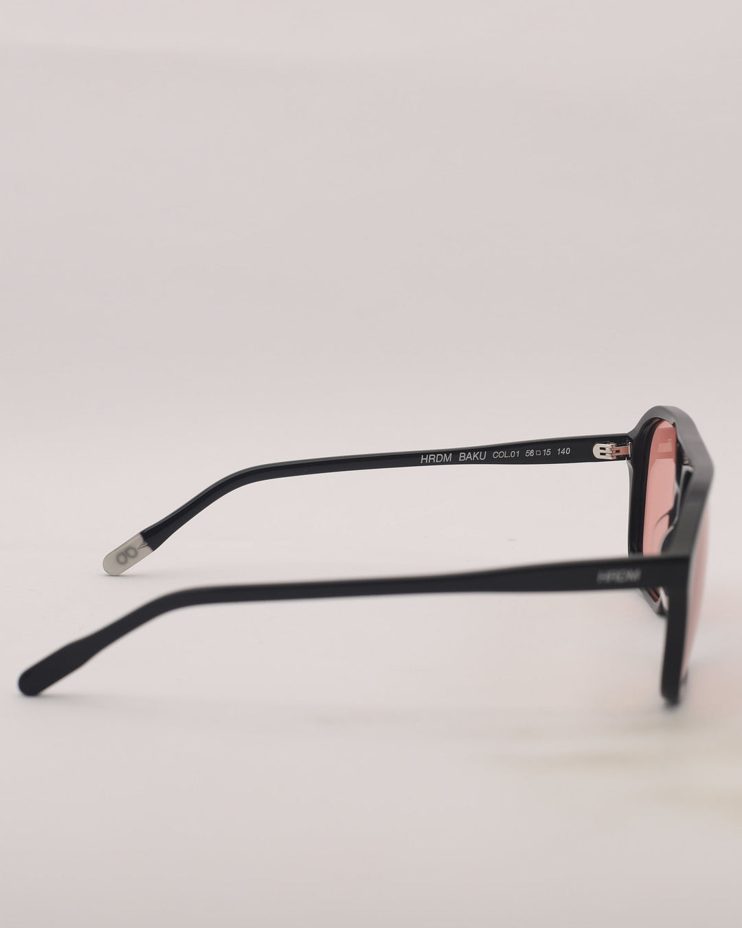 Black eyeglasses on a light gray background