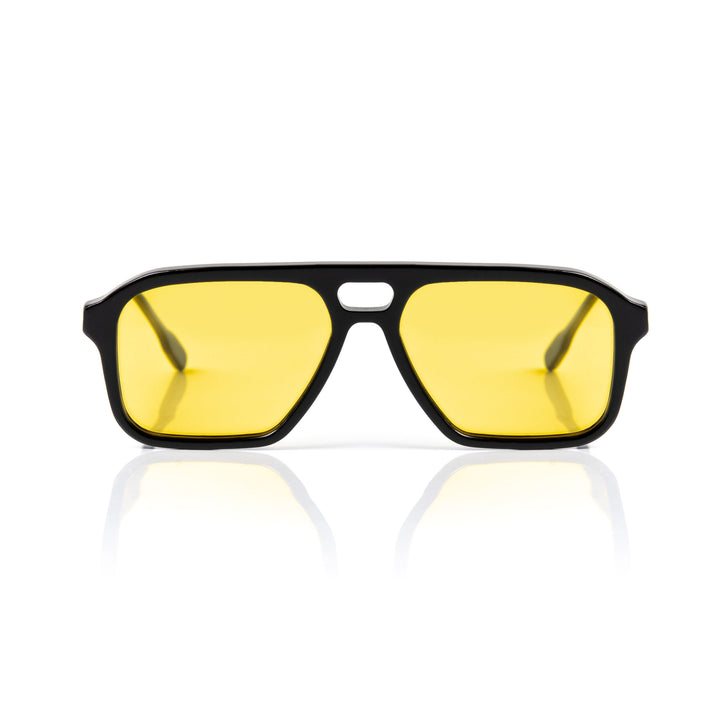 Sunglasses with yellow lenses and black frame on a white background