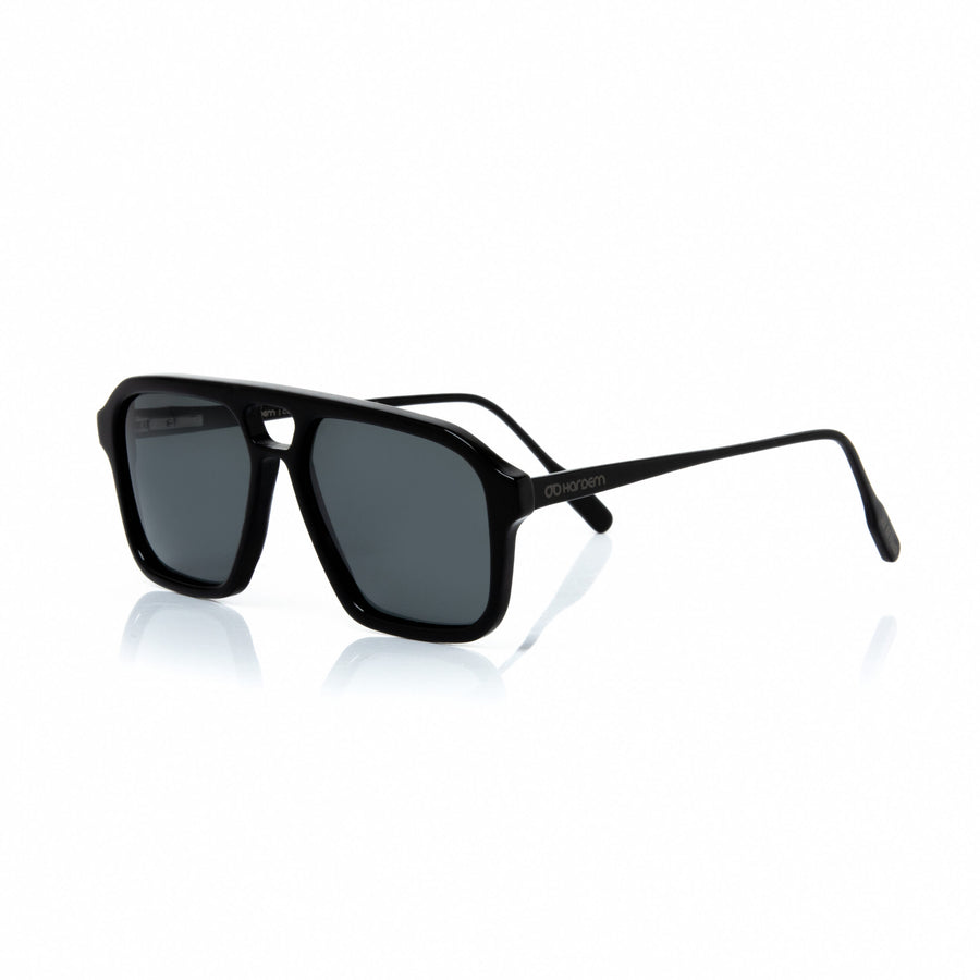 Black sunglasses with reflective surface on a white background