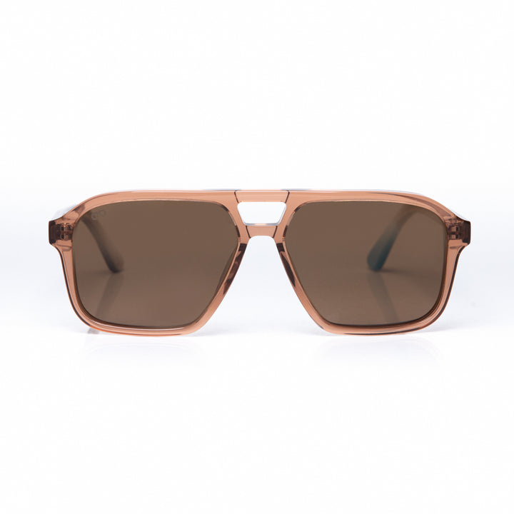 Sunglasses with brown lenses and rose gold frame on a white background