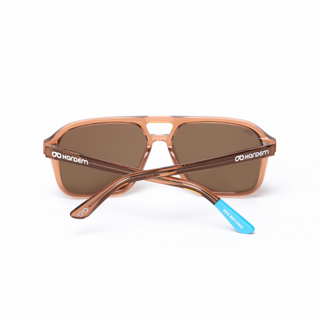 Sunglasses with brown frame and lenses on a white background
