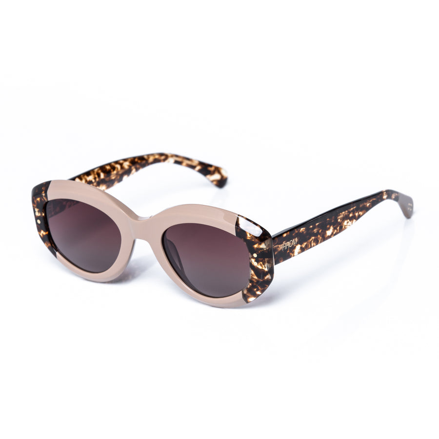 Sunglasses with tortoiseshell frame and dark lenses on a white background