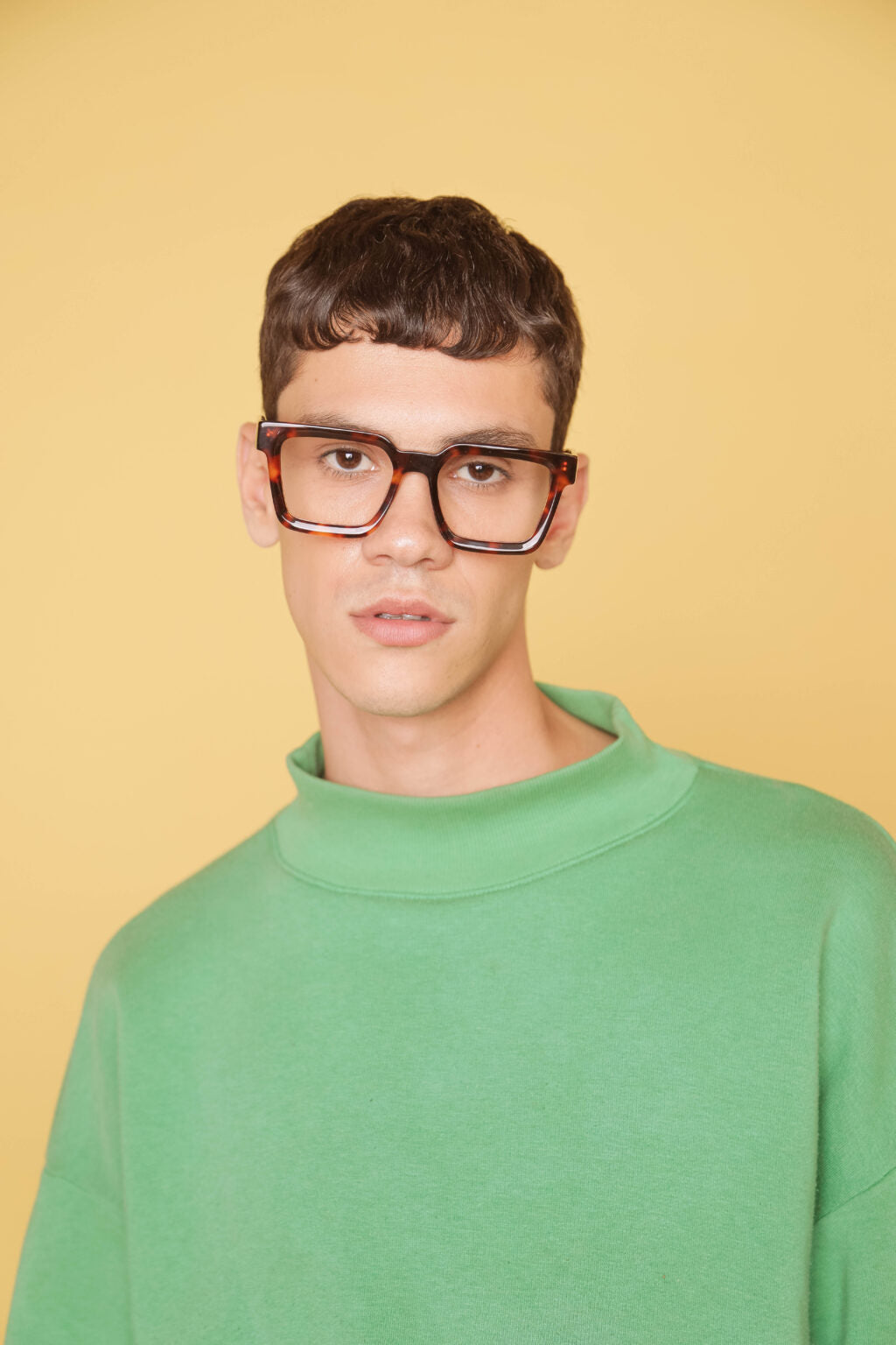 Man wearing Tortoise eyeglasses