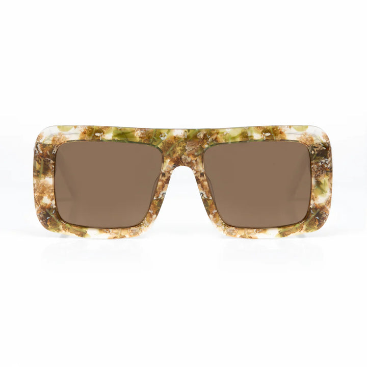 Sunglasses with a tortoiseshell frame and brown lenses on a white background