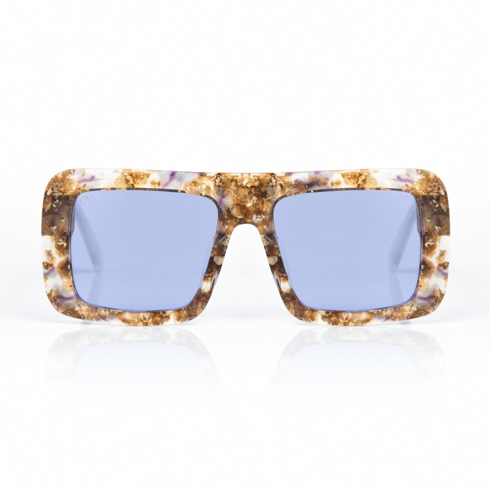 Sunglasses with tortoiseshell frame and blue lenses on a white background