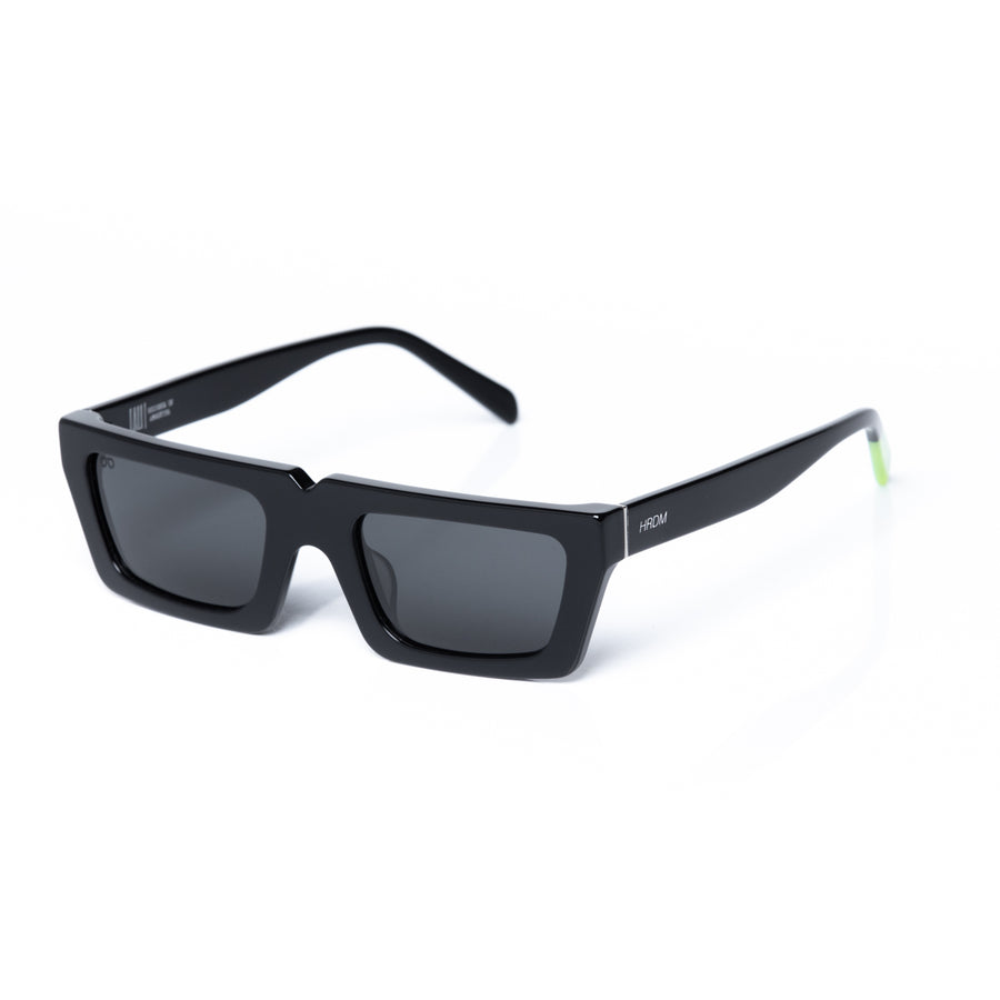 Black sunglasses with a brand logo on a white background