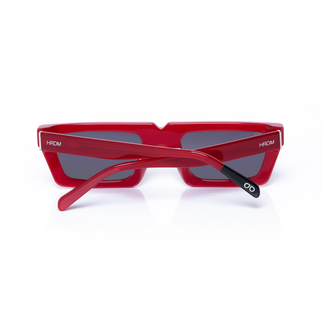 Red sunglasses with a white background