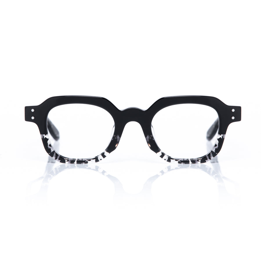 Black eyeglasses with a subtle pattern on a white background