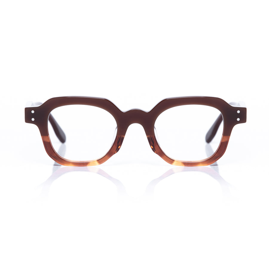 Brown tortoiseshell eyeglasses on a white background