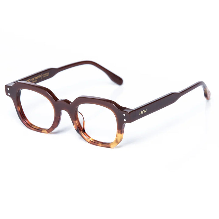 Brown and tortoiseshell eyeglasses on a white background