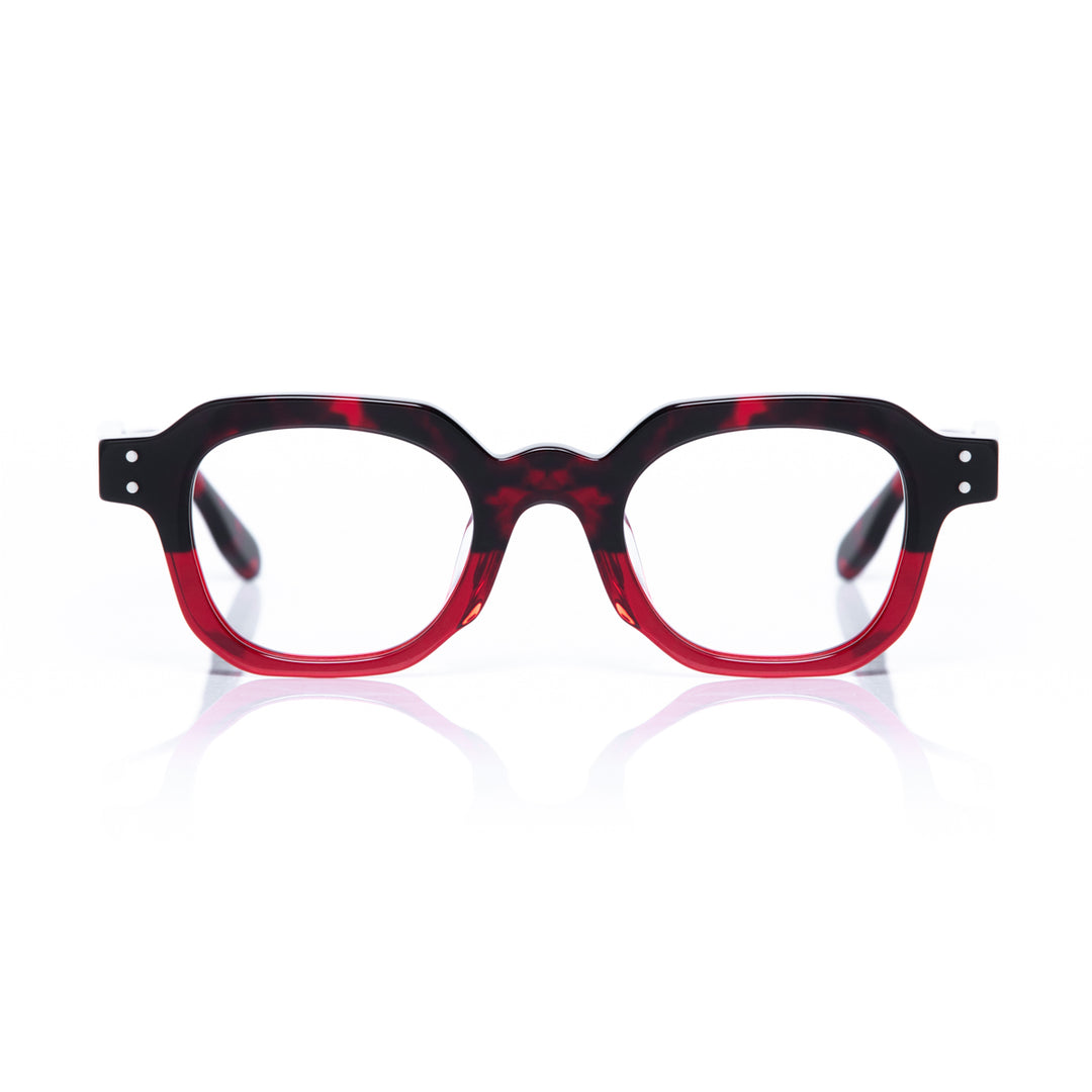 Red and black eyeglasses on a white background