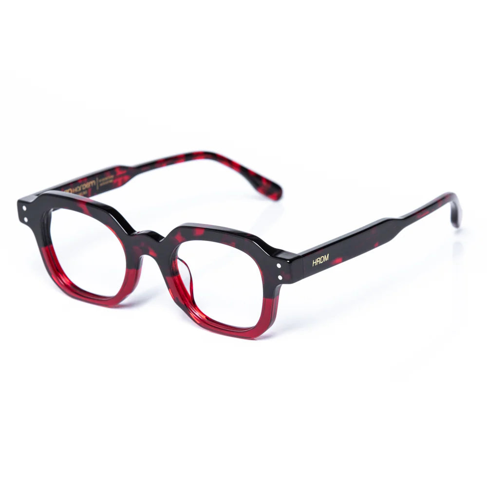 Black and red eyeglasses on a white background