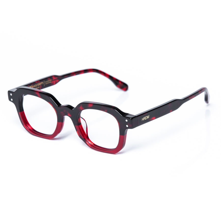 Black and red eyeglasses on a white background