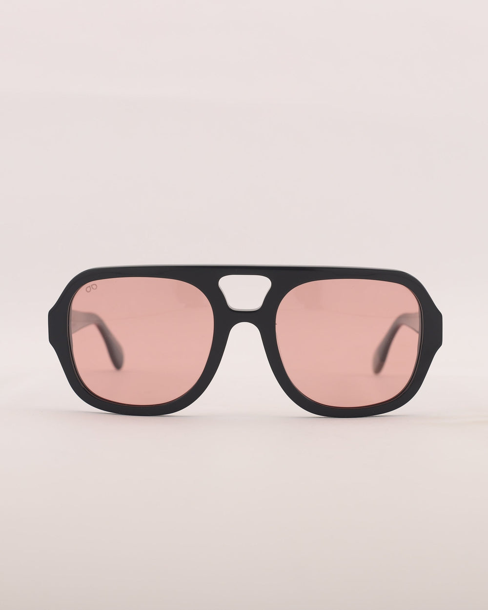 Black sunglasses with pink lenses 