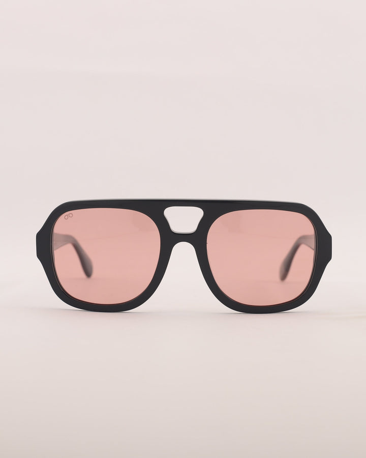Black sunglasses with pink lenses