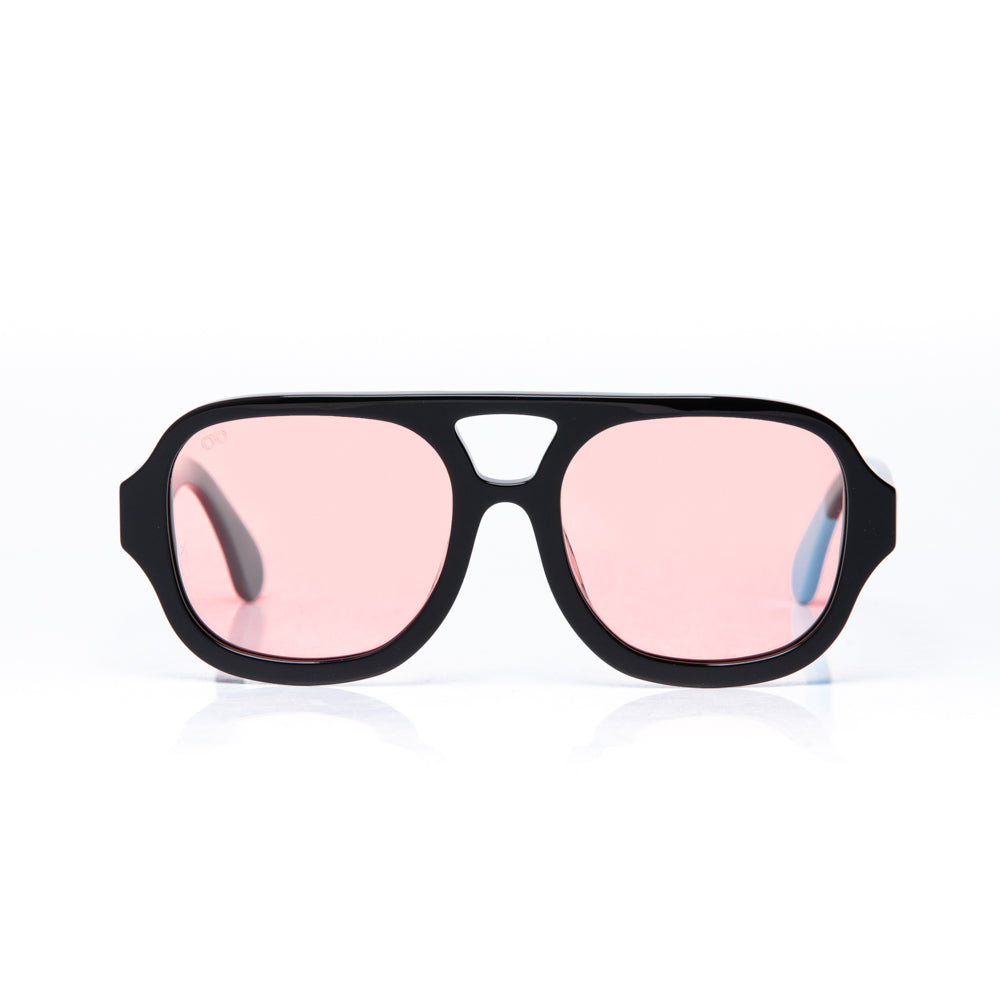 Black sunglasses with pink lenses on a white background