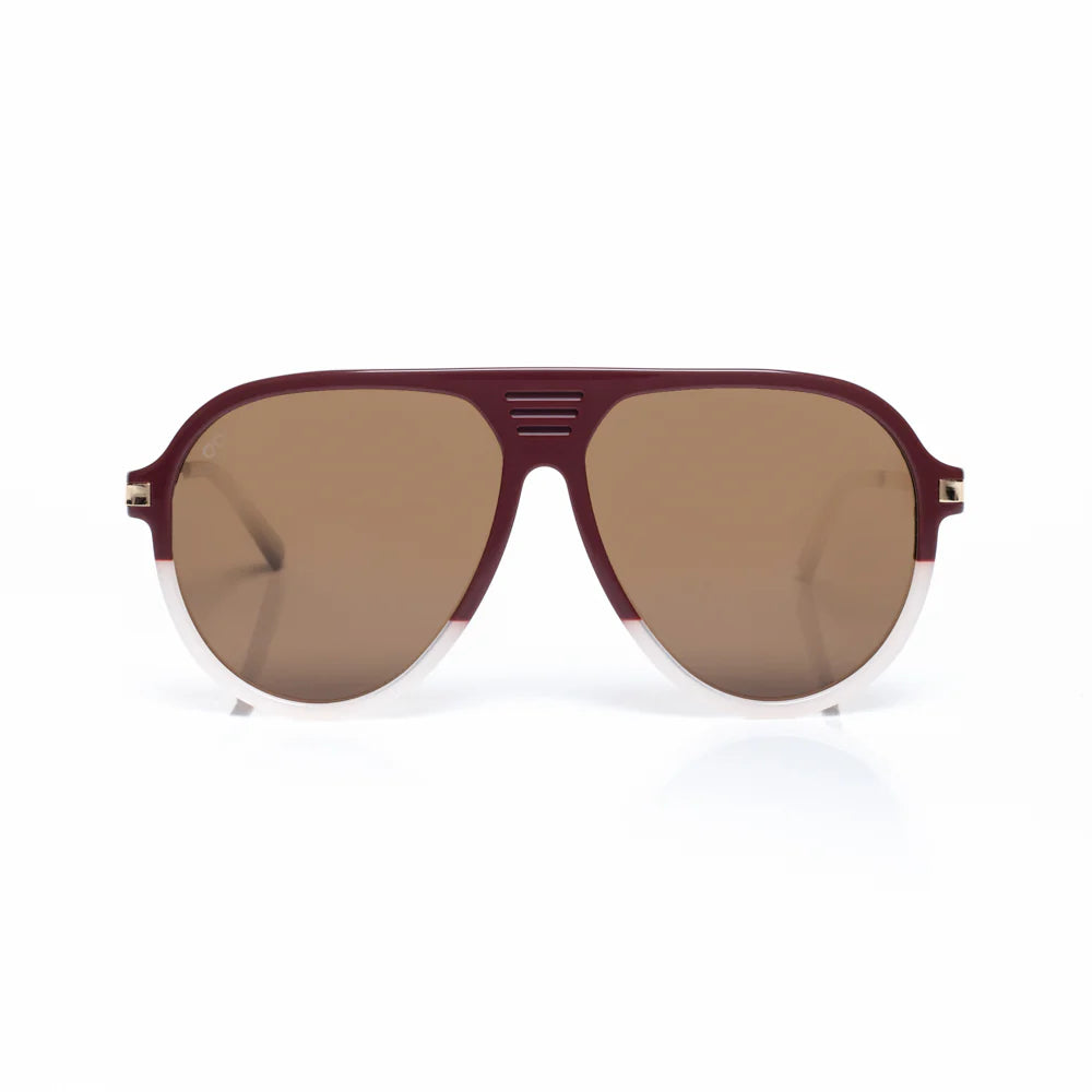 Aviator sunglasses with a maroon frame and brown lenses on a white background