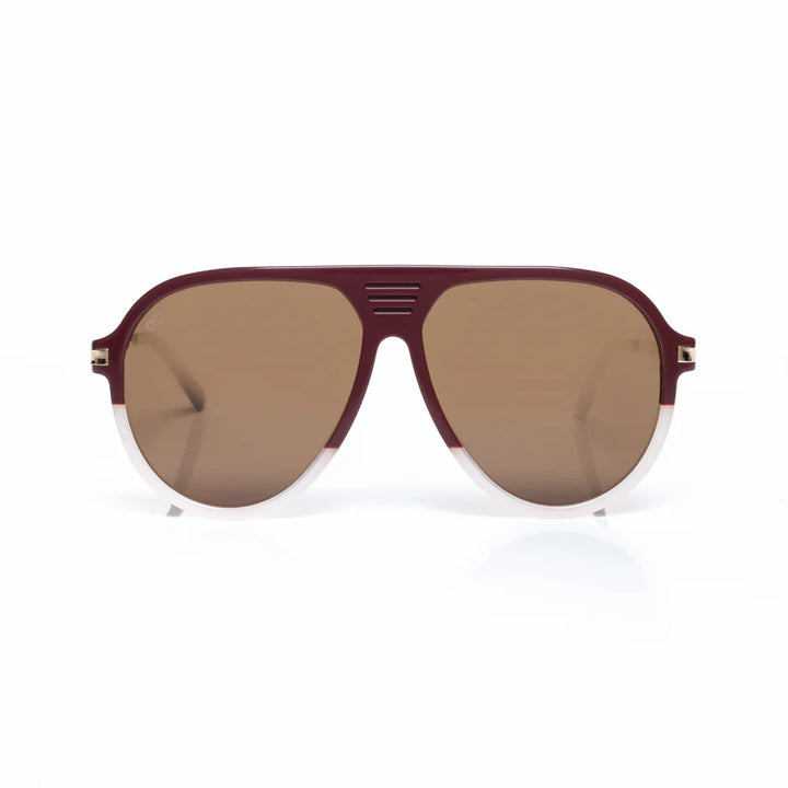 Aviator sunglasses with a maroon frame and brown lenses on a white background