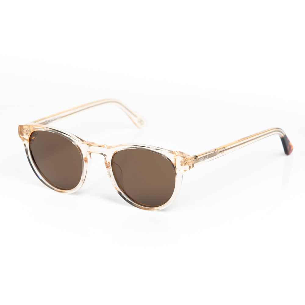 Gold-framed sunglasses with brown lenses on a white background